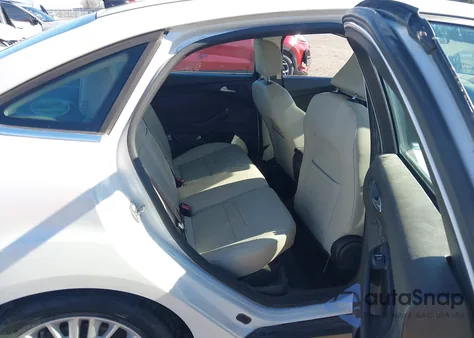 2015 Ford Focus Titanium from USA, damaged, VIN 1FADP3J26FL238527